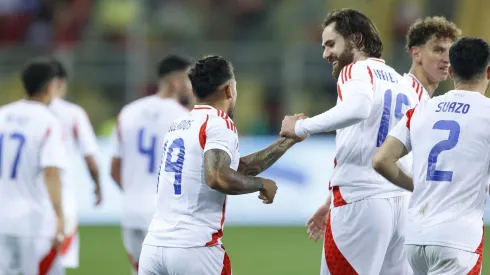 Bolados festeja con Brereton su gol por la Selección.
