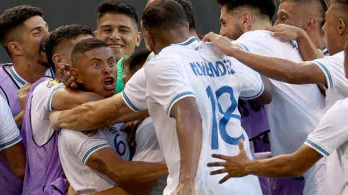 HARRISON, NEW JERSEY – JULY 04: Carlos Mejía #6 of Guatemala is surrounded by teammates after he scored the game winning goal during the second half of the Group D match against Guadeloupe the Concacaf Gold Cup at Red Bull Arena on July 04, 2023 in Harrison, New Jersey. Guatemala defeated Guadeloupe 3-2. (Photo by Elsa/Getty Images)
