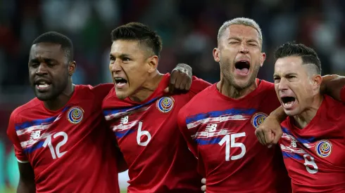 DOHA, QATAR – JUNE 14: Joel Campbell, Oscar Duarte, Francisco Calvo and Bryan Oviedo of Costa Rica sing their national anthem prior to the 2022 FIFA World Cup Playoff match between Costa Rica and New Zealand at Ahmad Bin Ali Stadium on June 14, 2022 in Doha, Qatar. (Photo by Mohamed Farag/Getty Images)
