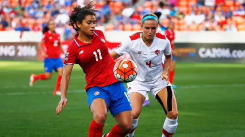 # of Canada battles for the ball with # of Costa Rica during the Semifinal of the 2016 CONCACAF Women's Olympic Qualifying at BBVA Compass Stadium on February 19, 2016 in Houston, Texas.
