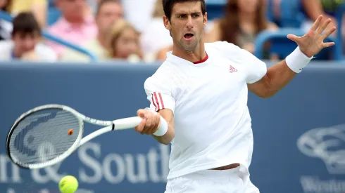 CINCINNATI – AUGUST 23:  Novak Djokovic of Serbia hits a forehand against Roger Federer of Switzerland in the Singles Final during day seven of the Western & Southern Financial Group Masters on August 23, 2009 at the Lindner Family Tennis Center in Cincinnati, Ohio.  (Photo by Nick Laham/Getty Images)
