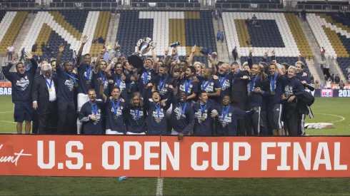 PHILADELPHIA, PA – SEPTEMBER 30:  Sporting Kansas City celebrates with the Lamar Hunt trophy after defeating the Philadelphia Union in penalty kicks on September 30, 2015 at PPL Park in Chester, Pennsylvania.  (Photo by Mitchell Leff/Getty Images)
