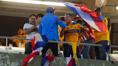 ZAPOPAN, MEXICO – MAY 28: Fans of Chivas and Tigres fight after the final second leg match between Chivas and Tigres UANL as part of the Torneo Clausura 2023 Liga MX at Akron Stadium on May 28, 2023 in Zapopan, Mexico. (Photo by Agustin Cuevas/Getty Images)
