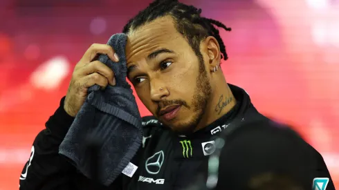 ABU DHABI, UNITED ARAB EMIRATES – DECEMBER 12: Second placed and  championship runner up Lewis Hamilton of Great Britain and Mercedes GP looks dejected in parc ferme  during the F1 Grand Prix of Abu Dhabi at Yas Marina Circuit on December 12, 2021 in Abu Dhabi, United Arab Emirates. (Photo by Bryn Lennon/Getty Images)
