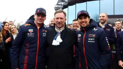 MILTON KEYNES, ENGLAND – DECEMBER 13: (L-R) Max Verstappen of the Netherlands and Oracle Red Bull Racing, Christian Horner, Team Principal of Oracle Red Bull Racing and Sergio Perez of Mexico and Oracle Red Bull Racing pose for a photo during Max & Checo's Homecoming at Red Bull Racing Factory on December 13, 2023 in Milton Keynes, England. (Photo by Mark Thompson/Getty Images)
