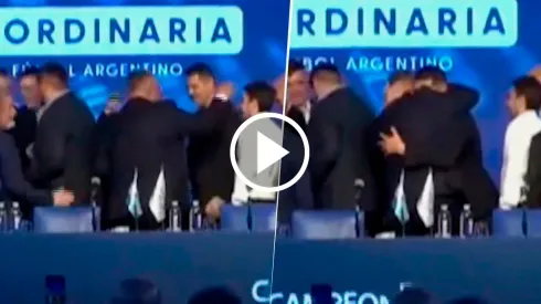 El abrazo de Román cn Chiqui Tapia.
