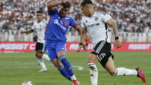 Carlos Palacios encara a Luis Casanova, un duelo que podría repetirse en el estadio Santa Laura para el Superclásico venidero. 
