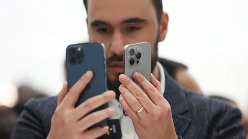 CUPERTINO, CALIFORNIA – SEPTEMBER 12:  An attendee looks at the brand new Apple iPhone 15 Pro and iPhone 15 Pro Max products during an Apple event on September 12, 2023 in Cupertino, California. Apple revealed its lineup of the latest iPhone 15 versions as well as other product upgrades during the event. (Photo by Justin Sullivan/Getty Images)
