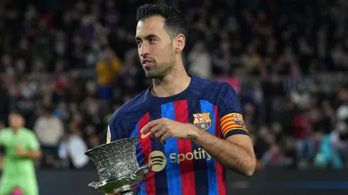 BARCELONA, SPAIN – JANUARY 22: Sergio Busquets of FC Barcelona presents the Spanish Supercopa Trophy to the fans prior to the LaLiga Santander match between FC Barcelona and Getafe CF at Spotify Camp Nou on January 22, 2023 in Barcelona, Spain. (Photo by Alex Caparros/Getty Images)
