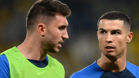 Cristiano Ronaldo of Al Nassr FC speask with Aymeric Laporte  (Photo by Justin Setterfield/Getty Images)

