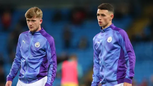 Tommy Doyle and Phil Foden of Manchester City. (Photo by Alex Livesey/Getty Images)
