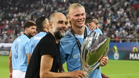 Guardiola e Haaland, talentos a serviço do Manchester City. (Photo by Claudio Villa/Getty Images)
