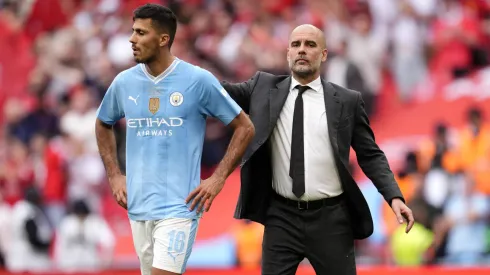 Rodri e Guardiola lado a lado
