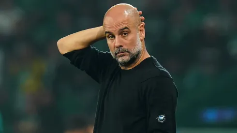 LISBON, PORTUGAL – NOVEMBER 05: Pep Guardiola, Manager of Manchester City, looks on during the UEFA Champions League 2024/25 League Phase MD4 match between Sporting Clube de Portugal and Manchester City at Estadio Jose Alvalade on November 05, 2024 in Lisbon, Portugal. (Photo by Gualter Fatia/Getty Images)
