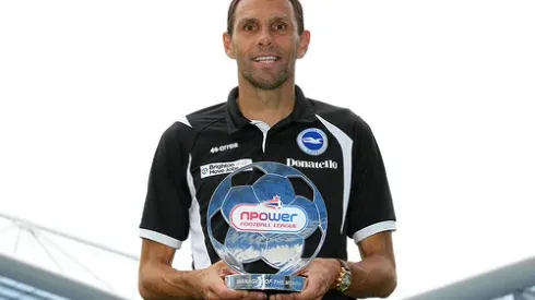 Pr Shoot - npower PR Shoot 09/09/2011 - The AMEX Stadium - 9/9/11 Brighton manager Gustavo Poyet with the Championship Manager of the Month trophy Mandatory Credit: Action Images / Peter Cziborra Livepic