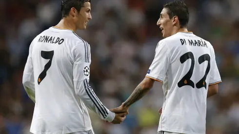 Real's Angel Di Maria, right is congratulated by Real's Cristiano Ronaldo after he scored during the Champions League group B soccer match between Real Madrid and FC Copenhagen at the Santiago Bernabeu stadium in Madrid, Wednesday, Oct. 2, 2013. (AP Photo/Daniel Ochoa de Olza)