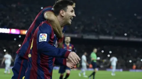 Barcelona's Argentinian forward Lionel Messi celebrates after scoring a goal during the Spanish Copa del Rey (King's Cup) quarter final first leg football match FC Barcelona vs Atletico de Madrid at the Camp Nou stadium in Barcelona on January 8, 2015. AFP PHOTO/ LLUIS GENE (Photo credit should read LLUIS GENE/AFP/Getty Images)