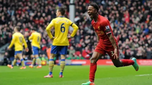 LIVERPOOL, ENGLAND - FEBRUARY 08: (THE SUN OUT, THE SUN ON SUNDAY OUT) Raheem Sterling of Liverpool celebrates his goal with Luis Suarez during the Barclays Premier League match between Liverpool and Arsenal at Anfield on February 8, 2014 in Liverpool, England. (Photo by John Powell/Liverpool FC via Getty Images)