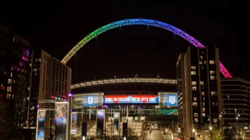 Wembley Stadium lit up in rainbow colors on Friday