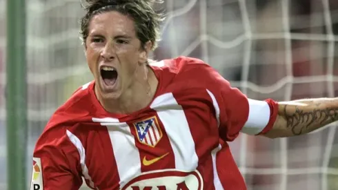 Atletico de Madrid's Fernando Torres, left celebrates with his team mate Mateja Kezman of Serbia – Montenegro after Torres scored against Barcelona during a Spanish league soccer match at the Vicente Calderon stadium in Madrid Sunday Sept. 18, 2005. (AP Photo/Paul White)