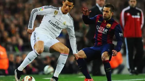BARCELONA, SPAIN – MARCH 22: Cristiano Ronaldo of Real Madrid CF takes on Jordi Alba of Barcelona during the La Liga match between FC Barcelona and Real Madrid CF at Camp Nou on March 22, 2015 in Barcelona, Spain. (Photo by David Ramos/Getty Images)