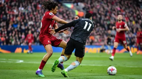 Arsenal's title hopes hurt as Liverpool comes from behind to draw