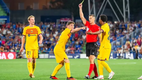 Barcelona faces new charges as police raid referee offices