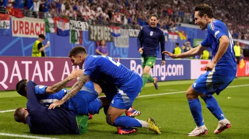 Italy wins knockout berth with 1-1 draw over Croatia