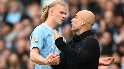 : Pep Guardiola, Manager of Manchester City, and his player, Erling Haaland clash upon his substitution during the Premier League match between Manchester City and Wolverhampton Wanderers at Etihad Stadium on May 04, 2024 in Manchester, England.
