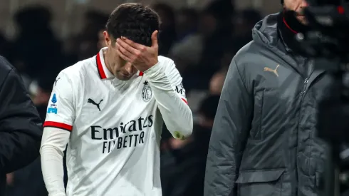 Christian Pulisic of AC Milan shows his dejection after his injury during the Serie A match between Atalanta and AC Milan at Gewiss Stadium on December 06, 2024 in Bergamo, Italy.