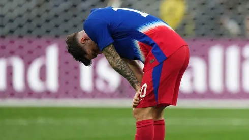 Christian Pulisic #10 of the United States reacts to a given up late goal during the second half of a CONCACAF Nations League semifinal match at SoFi Stadium on March 20, 2025 in Inglewood, California.