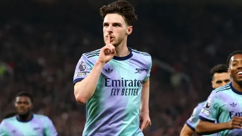 Declan Rice of Arsenal celebrates scoring his team's first goal during the Premier League match between Manchester United FC and Arsenal FC at Old Trafford on March 09, 2025 in Manchester, England.