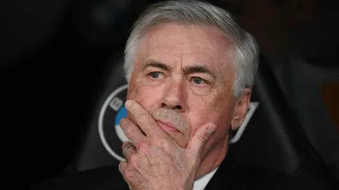 Carlo Ancelotti, Head Coach of Real Madrid, looks on from the dug out prior to the LaLiga match between Real Madrid CF and Valencia CF at Estadio Santiago Bernabeu on April 05, 2025 in Madrid, Spain.