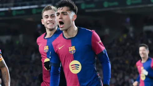 Pedri of FC Barcelona celebrates their team's first goal during the LaLiga match between FC Barcelona and Atletico de Madrid at Estadi Olimpic Lluis Companys on December 21, 2024 in Barcelona, Spain.