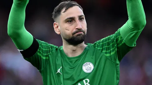 Gianluigi Donnarumma of Paris Saint-Germain celebrates after teammate Ousmane Dembele (not pictured) scores his team's first goal during the UEFA Champions League 2024/25 Semi Final First Leg match between Arsenal FC and Paris Saint-Germain at Emirates Stadium on April 29, 2025 in London, England.