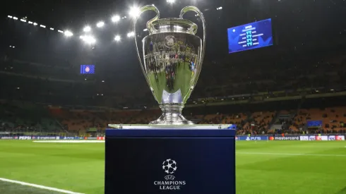The UEFA Champions League trophy is displayed on a plinth at the side of the pitch prior to the UEFA Champions League 2024/25 UEFA Champions League 2024/25 Round of 16 Second Leg match between FC Internazionale Milano and Feyenoord at on March 11, 2025 in Milan, Italy.