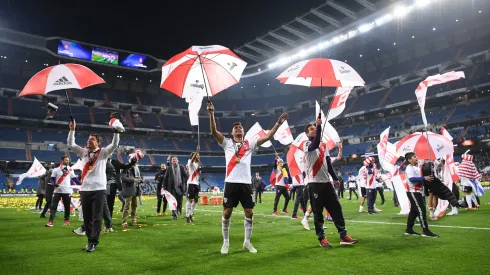 River Plate players celebrate victory with umbrellas after the second leg of the final match of Copa CONMEBOL Libertadores 2018.