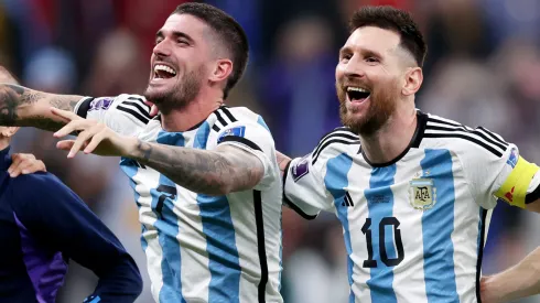 Rodrigo De Paul and Lionel Messi of Argentina celebrate after the team's victory during the FIFA World Cup Qatar 2022 semi final match between Argentina and Croatia at Lusail Stadium on December 13, 2022 in Lusail City, Qatar.