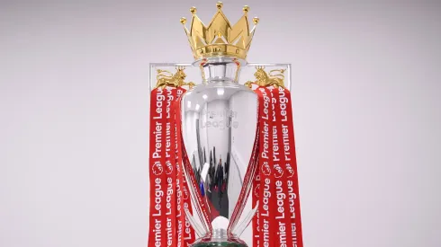 The Premier League Trophy is dressed in Liverpool Red Ribbons ready for the presentation ceremony ahead of the Premier League match between Liverpool FC and Chelsea FC at Anfield on July 22, 2020.