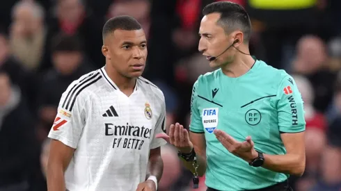 Kylian Mbappe of Real Madrid speaks with Referee Sanchez Martinez during a LaLiga match vs. Athletic Club.