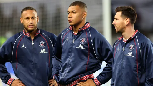 Paris Saint-Germain's Argentinian forward Lionel Messi, Neymar and Kylian Mbappe during the French L1 football match between Paris-Saint Germain (PSG) and Olympique Lyonnais at The Parc des Princes Stadium in Paris on September 19, 2021.