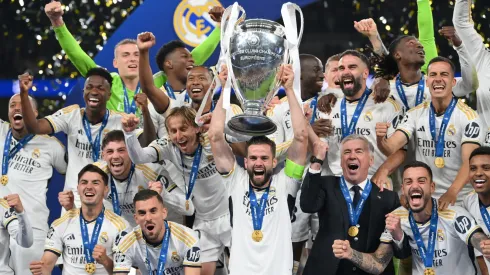 Nacho Fernandez of Real Madrid lifts the UEFA Champions League Trophy in 2024.