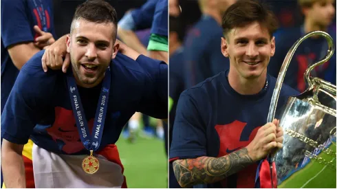 Jordi Alba and Lionel Messi from FC Barcelona celebrate the Champions League title
