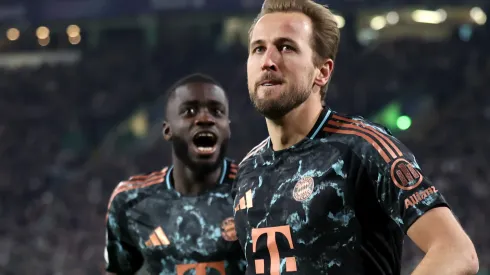 Harry Kane of Bayern Munich celebrates scoring a goal with Dayot Upamecano.