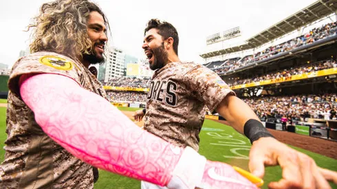 SAN DIEGO, CA - MAY 8: Jorge Alfaro #38 and Eric Hosmer #30 of the San Diego Padres celebrates after hitting a walk off home run in the ninth inning against the Miami Marlins on May 8, 2022 at Petco Park in San Diego, California. (Photo by Matt Thomas/San Diego Padres/Getty Images)