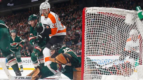 SAINT PAUL, MN - MARCH 29: Marc-Andre Fleury #29 and Dmitry Kulikov #7 of the Minnesota Wild defend their goal against James van Riemsdyk #25 of the Philadelphia Flyers during the game at the Xcel Energy Center on March 29, 2022 in Saint Paul, Minnesota. (Photo by Bruce Kluckhohn/NHLI via Getty Images)