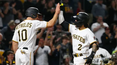 PITTSBURGH, PA - APRIL 30: Michael Chavis #2 of the Pittsburgh Pirates celebrates with Bryan Reynolds #10 after hitting a two-run home run in the eighth inning against the San Diego Padres during the game at PNC Park on April 30, 2022 in Pittsburgh, Pennsylvania. (Photo by Justin K. Aller/Getty Images)