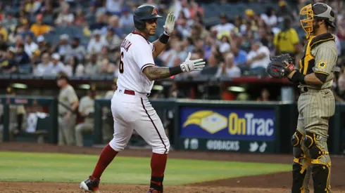 PHOENIX, ARIZONA - APRIL 09: Outfielder David Peralta #6 of the Arizona Diamondbacks claps as he scores the tying run during the MLB game between the San Diego Padres and the Arizona Diamondbacks at Chase Field on April 09, 2022 in Phoenix, Arizona. (Photo by Rebecca Noble/Getty Images)