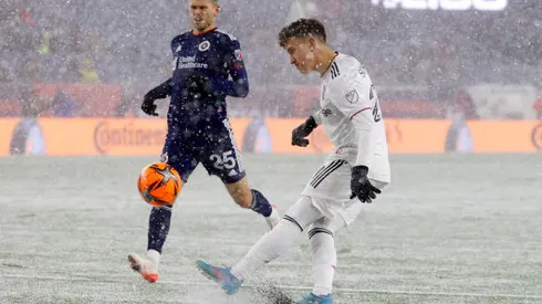 FOXBOROUGH, MA - MARCH 12: Real Salt Lake midfielder Tate Schmitt (21) chips the ball during a match between the New England Revolution and Real Salt Lake on March 12, 2022, at Gillette Stadium in Foxborough, Massachusetts. (Photo by Fred Kfoury III/Icon Sportswire via Getty Images)