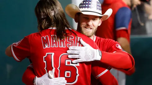 ARLINGTON, TEXAS - MAY 17: Taylor Ward #3 of the Los Angeles Angels celebrates with Brandon Marsh #16 of the Los Angeles Angels after hitting a solo home run against Taylor Hearn #52 of the Texas Rangers in the top of the third inning at Globe Life Field on May 17, 2022 in Arlington, Texas. (Photo by Ron Jenkins/Getty Images)